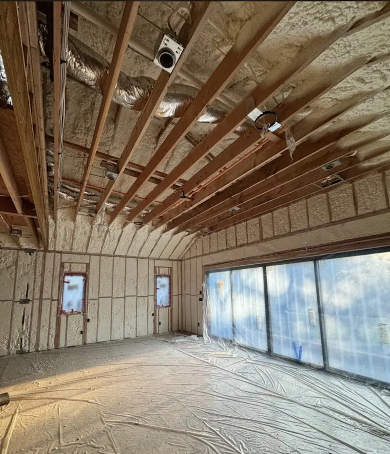 Interior walls and ceiling insulated with spray foam during new construction in Glenn Heights